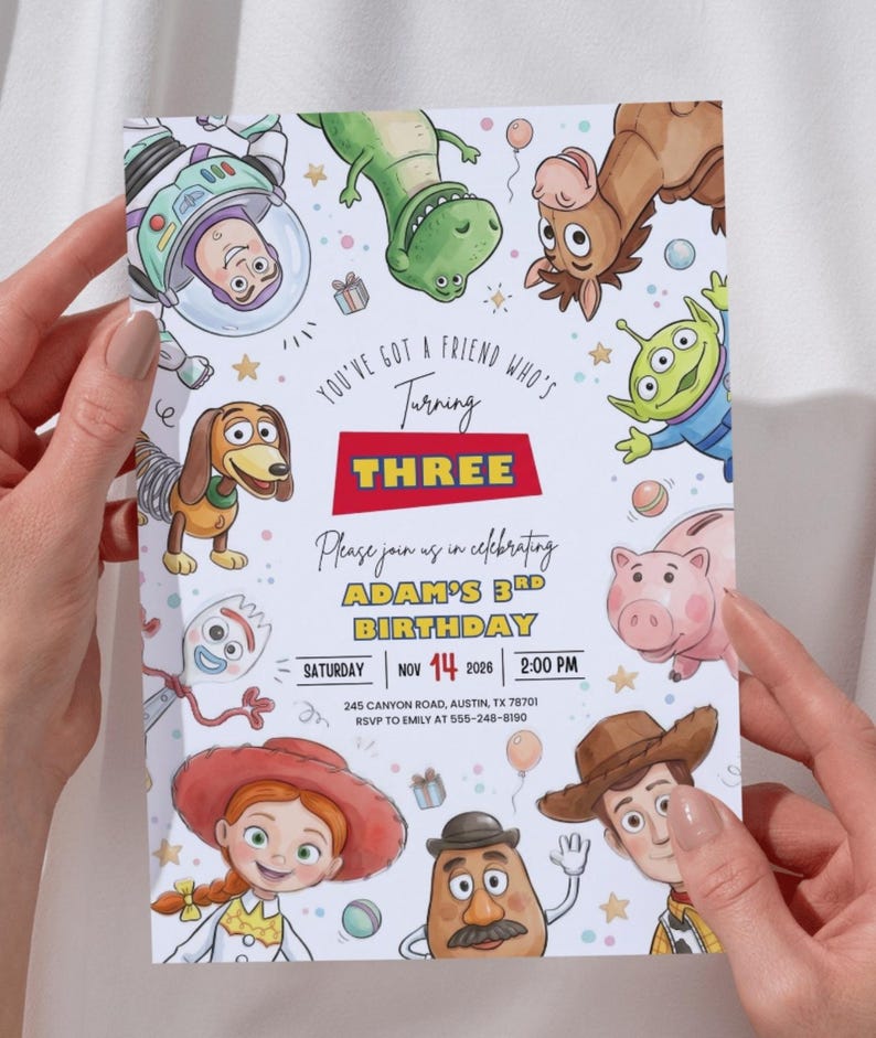 May include: A rectangular birthday invitation card featuring colorful cartoon illustrations of various toy characters. The text reads: You've got a friend who's turning THREE. Please join us in celebrating ADAM'S 3RD BIRTHDAY. SATURDAY NOV 14 2026 2:00 PM.
