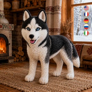 May include: A handcrafted crochet husky dog figurine featuring a black and white yarn coat, pointed ears, and bright blue eyes. The plush toy stands on four legs with a detailed snout, a black nose, and an open mouth showing a pink tongue.