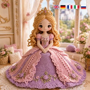 May include: A handcrafted crochet doll with long wavy blonde hair and a gold crown featuring small pearls. The doll wears a detailed gown with a light pink bodice, puffed sleeves, and a voluminous purple skirt adorned with small crocheted roses.