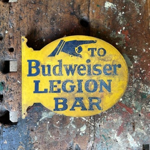 Original Budweiser Beer Tin Advertising Flange Sign C. 1930&#39;s Hand Painted &quot;To Legion Bar&quot; Script With Finger Pointer Graphic.