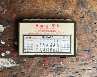 1954 N.O.S. Sunny Kid Beverages Desk Calendar & Index.