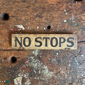 C. 1920&#39;s No Stops Hand Painted Metal Trolley Car Sign.