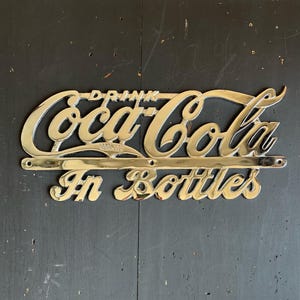 1940 Drink Coca-Cola In Bottles Delivery Truck Radiator Sign | Original Cast Aluminum Advertising Emblem by Crown Manufacturing Co.