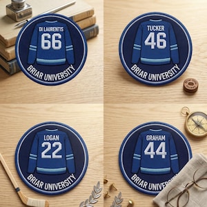 May include: Four round patches featuring a blue hockey jersey design with white numbers and player names. Each patch has the words "Briar University" around the edge. The names and numbers are Di Laurentis 66, Tucker 46, Logan 22, and Graham 44.