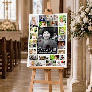 May include: A rectangular memorial photo collage board displayed on a wooden easel. The board features a large central black and white portrait of a person surrounded by numerous smaller colour photographs. The text reads Victoria Smith January 3, 1945 - August 14, 20xx.