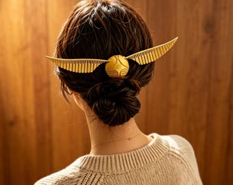 Magical Golden Snitch Hair Clip with Spread Wings for Fantasy Themed Updo and Bun Styles
