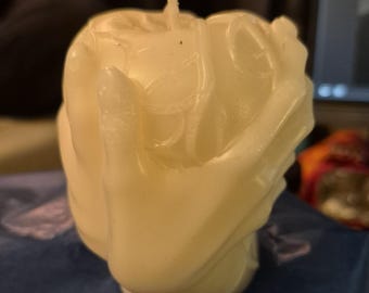cupped hands candle