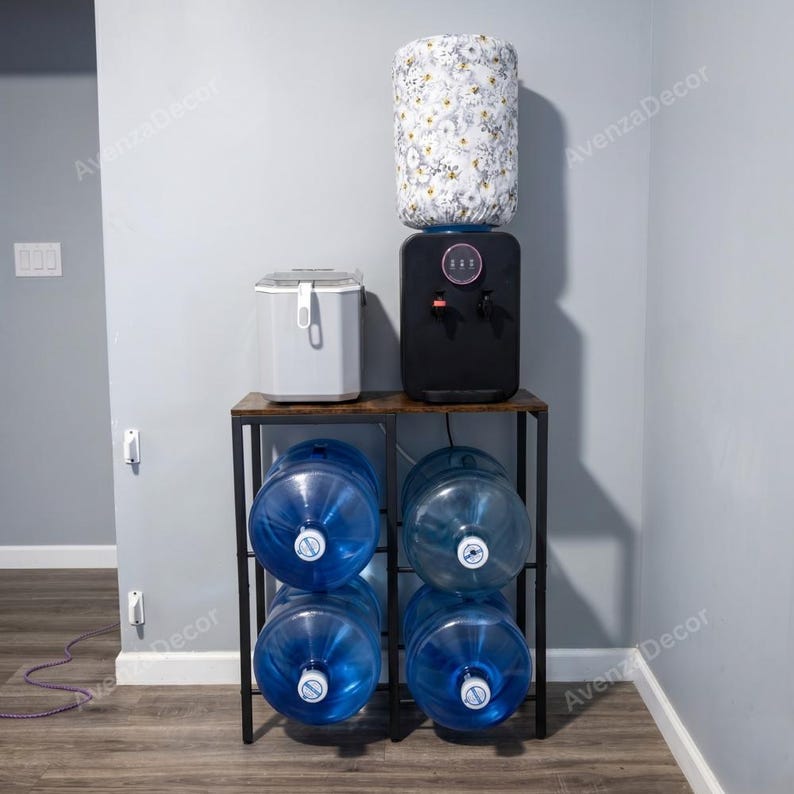 May include: A black metal water cooler stand with a wooden top shelf holding a black water cooler and a white appliance. The cooler features a floral patterned fabric cover on the water jug. Four large blue plastic water jugs are stored on the lower shelves.