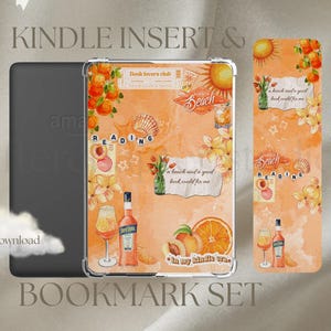 May include: A Kindle insert and bookmark set with a beach theme. The insert and bookmark feature orange and yellow watercolour designs with text that reads "READING" and "Beach". Includes images of a cocktail, fruit, and flowers.