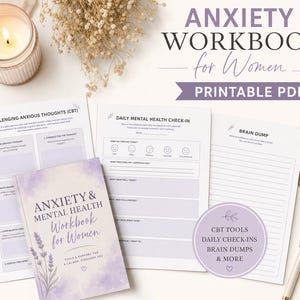 May include: A printable anxiety workbook featuring a cover with lavender watercolor accents and the text Anxiety & Mental Health Workbook for Women. Includes pages for challenging anxious thoughts, daily mental health check-ins, and brain dumps.