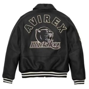 May include: A black varsity jacket featuring the text AVIREX in an arched font above a graphic of a panther head and the text Black Aces. The jacket has a collar, long sleeves, and black and white striped ribbed cuffs and hem.