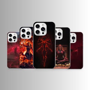 May include: Five smartphone cases featuring Scarlet Witch imagery. The designs include a figure in a red costume, a silhouette with geometric patterns, a character meditating amidst candles, and a close-up of a red headpiece against a dark background.