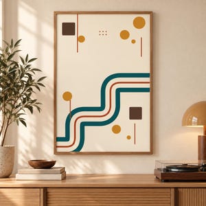 May include: A rectangular wall art print in a wooden frame featuring an abstract design on a cream background. The artwork displays teal and terracotta wavy lines, dark brown squares, and mustard yellow circles arranged in a geometric pattern.