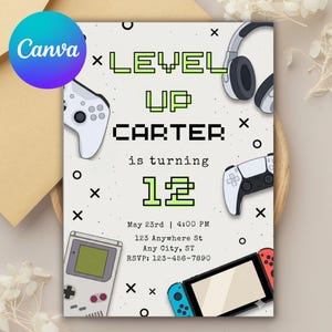 May include: A light grey birthday invitation with a gaming theme. The invitation features the text "LEVEL UP CARTER is turning 12" in green pixelated font, along with game controllers, headphones, and a handheld game console.