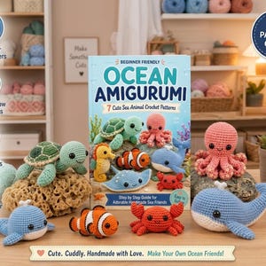 Op de afbeelding: Een A5-patroongids getiteld Ocean Amigurumi met 7 haakpatronen voor zeedieren. De gids is omringd door gehaakte zeedieren, waaronder een groene schildpad, oranje clownvis, roze octopus, rode krab en blauwe walvissen.