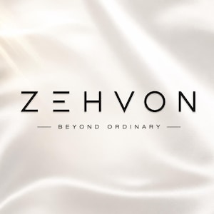 May include: The logo for ZEHVON is displayed in black, sans-serif capital letters against a soft, off-white, draped fabric background. Below the brand name, the text BEYOND ORDINARY is centered between two horizontal lines in black.
