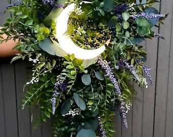 Ramo de flores artificiales en cascada con forma de luna creciente celestial, boda celestial, ambiente melancólico y oscuro
