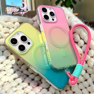 Puede incluir: Dos fundas para tel&eacute;fono con colores degradados. Una funda transita de rosa a amarillo, y la otra de amarillo a verde azulado. Ambas cuentan con un anillo magn&eacute;tico circular en la parte posterior y un recorte para la c&aacute;mara. Incluye una correa.