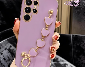 Étui pour portable de luxe avec bracelet cœur et chaîne