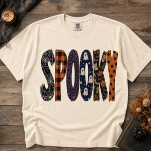 T-shirt met patchwork-look voor Halloween, met spookjes, spinnenwebben en een ruitjespatroon voor de herfst.