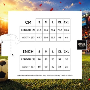 May include: A t-shirt size chart displaying measurements in inches and centimeters for sizes S through 2XL. The chart includes length and width dimensions, a diagram of a t-shirt labeled A and B, and the Reel Threads logo. Text states measurements may vary by approximately 2.5 cm or 1 inch.