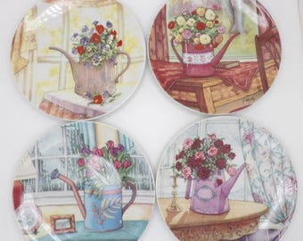 Four Seasons Of Light Gardening Collectors Plates By Kathy O'Malley Set of 4