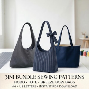 Op de afbeelding: Een 3-in-1 bundel naaipatronen voor hobo-tassen, tote bags en tassen met strik. De afbeelding toont drie afgewerkte tassen: een effen donkergrijze hobo-tas, een marineblauwe hobo-tas met witte krijtstrepen en een strik, en een effen marineblauwe tote bag.