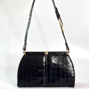 Borsa a tracolla vintage anni '50 in pelle nera con stampa coccodrillo.
