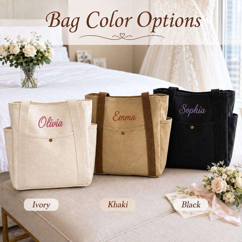 May include: Three canvas tote bags in ivory, khaki, and black, each featuring two side pockets, a front pocket with a snap button, and embroidered names. The text "Bag Color Options" appears at the top, with labels "Ivory," "Khaki," and "Black" below.