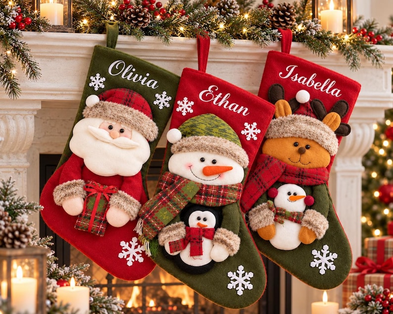 May include: Three Christmas stockings featuring plush characters: a Santa Claus on a green stocking, a snowman with a penguin on a red stocking, and a reindeer with a small snowman on a red stocking. Each stocking is personalized with names.
