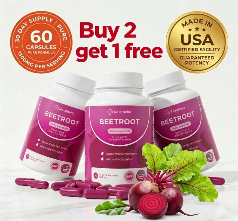 May include: Three white Rosabella Beetroot dietary supplement bottles with pink labels, capsules, and beetroots. The bottles have a white cap and the text "Buy 2 get 1 free". The image also includes a "Made in USA" seal.
