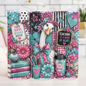 May include: A cylindrical tumbler featuring a vibrant patchwork design in shades of pink and teal. The graphic includes a goose, flowers, books labeled DEDICATED, PASSIONATE, MAKING A DIFFERENCE, and text reading TEACH INSPIRE ENCOURAGE REPEAT.