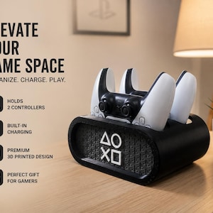 May include: A black 3D printed charging dock for two game controllers, featuring white PlayStation symbols on the front. The text on the image reads: ELEVATE YOUR GAME SPACE, ORGANIZE. CHARGE. PLAY., HOLDS 2 CONTROLLERS, BUILT-IN CHARGING, PREMIUM 3D PRINTED DESIGN, PERFECT GIFT FOR GAMERS.