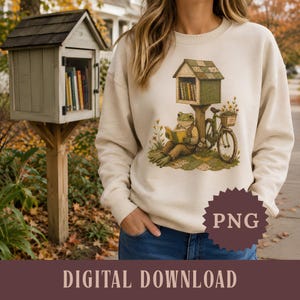 Frog Reading at a Little Library PNG, Bookish Cottagecore Faux Patchwork Quilt Book Lover Gift, Woodland Animal Reader with Bike Sweatshirt