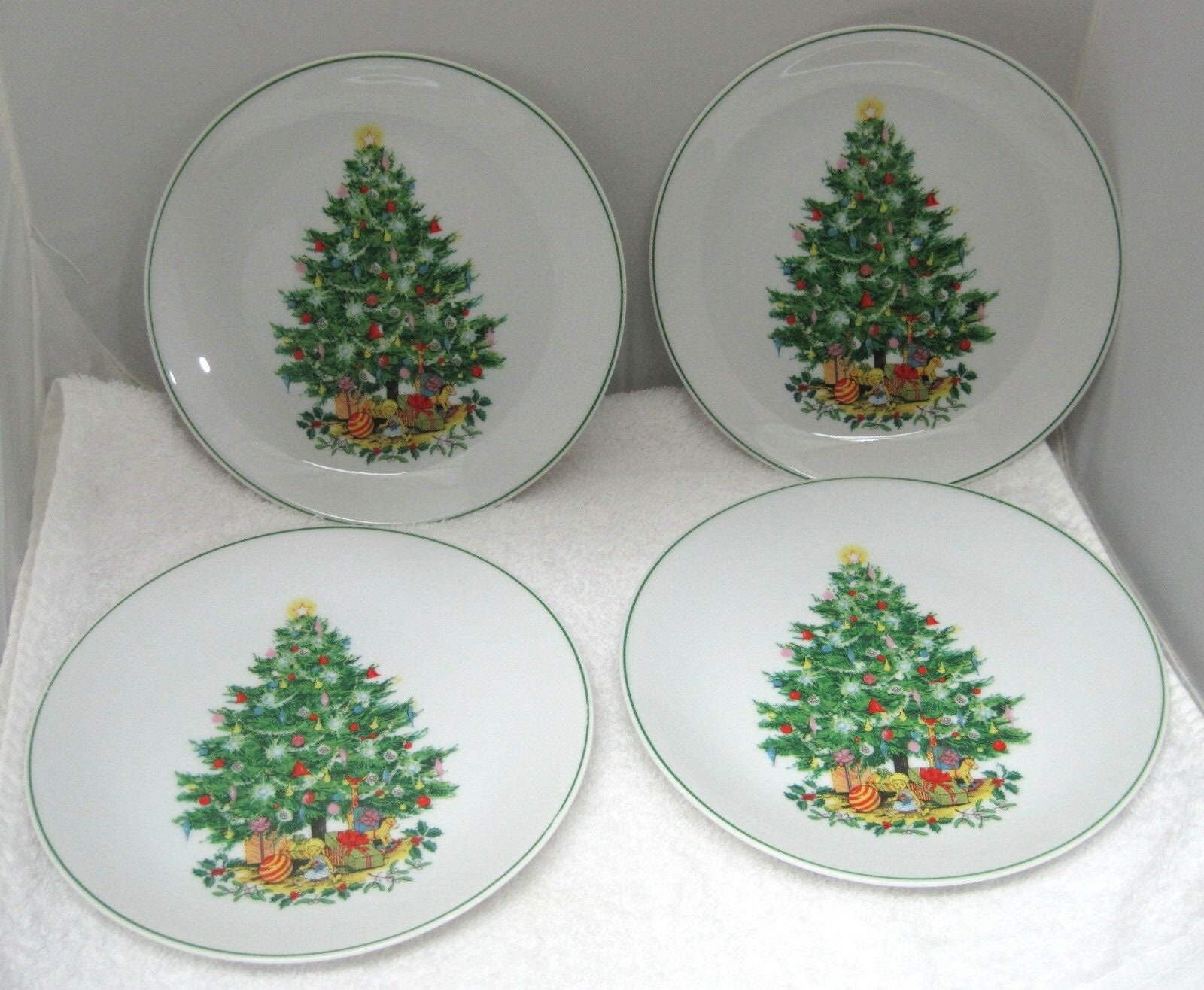Saks Fifth Ave Little Tree Christmas Porcelain Plates made Germany and Numbered 