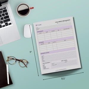 May include: A printed 8.5 x 11 inch call sheet breakdown form with a purple and gray design. The form is on a light blue surface with a laptop, coffee cup, mouse, glasses, and pen.