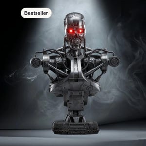 May include: A metallic gray Terminator bust with glowing red eyes. The bust features intricate mechanical details and is mounted on a base with the text "THE TERMINATOR". The word "Bestseller" is in a white oval in the upper left corner.