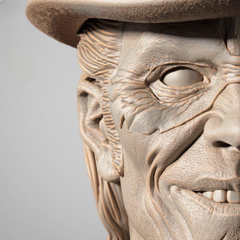 May include: A detailed, close-up of a sculpted face with a hat. The face is light beige with visible wrinkles and a slight smile. The hat is a darker beige, and the hair is a light brown. The sculpture has a realistic, textured appearance.