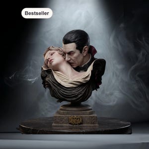 May include: A detailed bust of Dracula biting a woman's neck. The sculpture features a dark-haired Dracula with a stern expression and a woman with closed eyes. The base of the bust has the word "DRACULA" in gold lettering. The word "Bestseller" is in the top left corner.