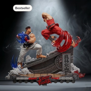 May include: A detailed Street Fighter statue depicting two characters in action poses. One figure is in white and the other in red, with blue and red energy effects. The base features the words "Super Street Fighter" and Japanese text.