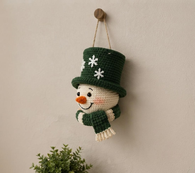 Crochet Snowman Wall Hanging Pattern, Christmas Door Decor, Amigurumi Snowman PDF, Winter Holiday Crochet Pattern, Handmade Decor
Christmas Ornament Crochet Pattern PDF, Snowman Wall Hanging, Amigurumi Holiday Decor, Instant Download 
Crochet Snowman Wreath Pattern, Christmas Wall Hanging Decor (PDF Download)