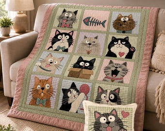 May include: A quilted throw blanket featuring a grid of twelve squares, each displaying a unique cartoon cat illustration, including a fish skeleton. A matching square throw pillow shows a gray cat with a pink bow tie and the text MEOWLO.