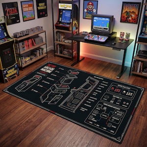 May include: A rectangular black area rug featuring a detailed white technical diagram of a retro arcade machine. The print includes labels for components like the control panel, monitor, and wiring diagram, with the text Retro Arcade Machine Layout.