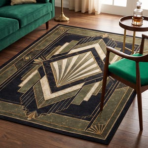 May include: A rectangular area rug featuring a dark navy blue and olive green geometric pattern with cream-colored fan-shaped accents and marble-like textures. The design includes symmetrical lines and angular shapes arranged in a central motif.