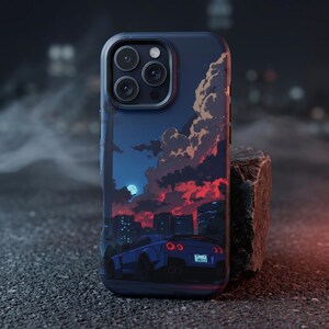 May include: A smartphone case featuring a dark blue sports car parked in a city at night under a moonlit sky with red and orange clouds. The design includes a tall tower silhouette, city buildings, and a rear view of the car with round taillights.