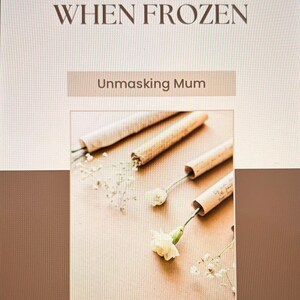 May include: Image features the text "WHAT TO DO WHEN FROZEN" and "Unmasking Mum". The image shows several rolled paper tubes with flowers and sprigs of baby's breath on a light brown surface.