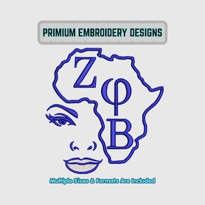 Op de afbeelding: Een blauw borduurontwerp met de omtrek van het Afrikaanse continent met de Griekse letters Z, Φ en B. Een vrouwengezicht is in het ontwerp verwerkt. De tekst "PRIMIUM EMBROIDERY DESIGNS" en "Multiple Sizes & Formats Are Included" zijn ook aanwezig.