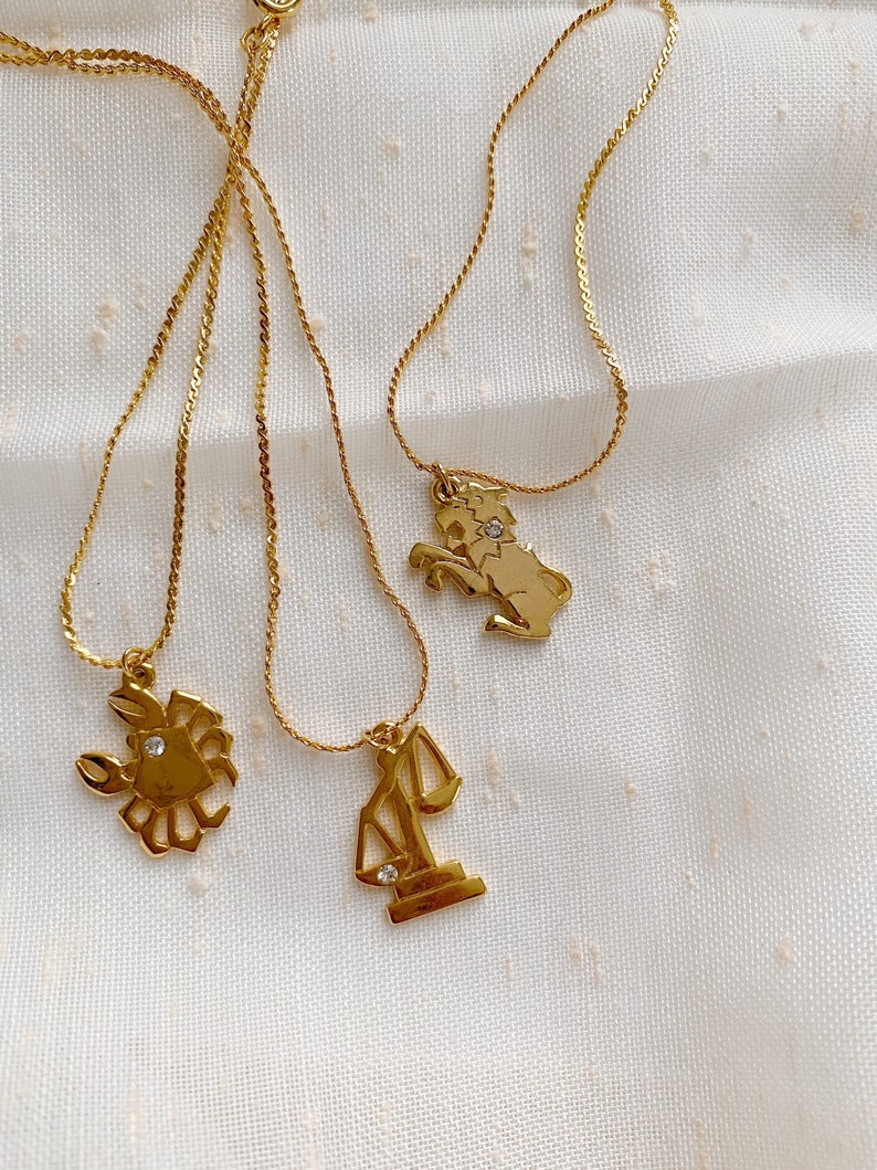 Dainty Gold Zodiac Necklaces with Rhinestone Accents image 1