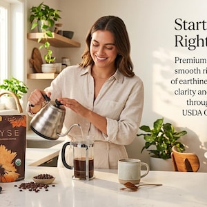 May include: A woman pours hot water into a French press, preparing mushroom coffee. A bag of RYSE mushroom coffee with a sunflower design sits on the counter. The text "Start Your Day Right" is visible, along with details about the coffee's benefits.
