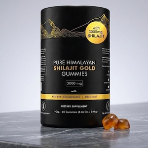 May include: A black cylindrical container of Pure Himalayan Shilajit Gold Gummies. The label features gold mountain graphics and text that reads "with 3000mg Shilajit". The container also lists ingredients and dietary supplement information. Two amber-colored gummies are in front.